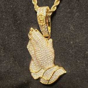 Gold Praying Pendant with 24 inch chain.